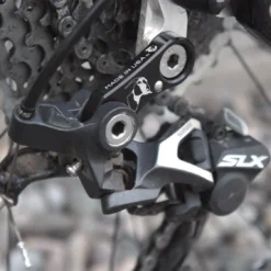 Wolf-tooth Wolf Tooth GoatLink Derailleur Hanger Extension For 10S Shimano Shadow RD+ Derailleur 5 Wolf-tooth Wolf Tooth GoatLink Derailleur Hanger Extension For 10S Shimano Shadow RD+ Derailleur -Sram Bike Shop 206753860c364d8342b13.46162060